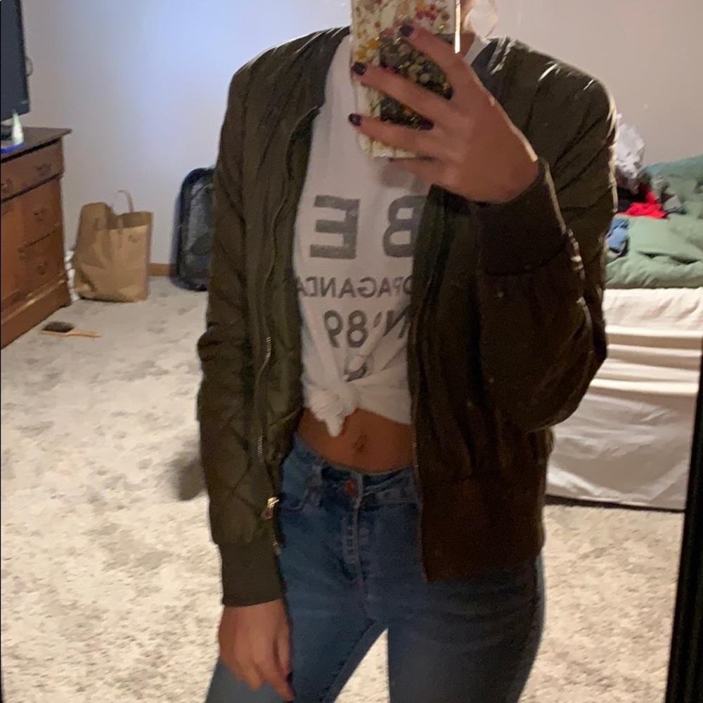 Green bomber jacket.